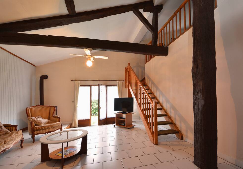 The spacious lounge, leading to the mezzanine level.