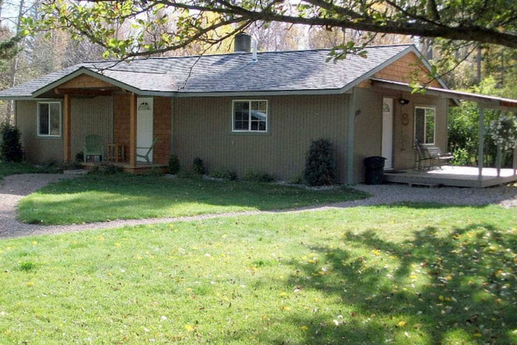 Large yard, lots of room to roam. Has raspberry bushes, an apple tree, flowers. Humming birds roam here.