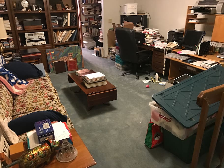 Your bedroom is just behind the office and the library. It feel free to hang out on one of the comfy couches. This is not a couch to judge by its cover. It's deceptively pleasant