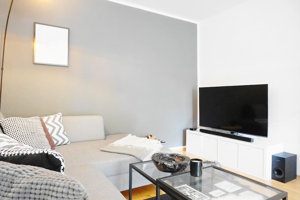 You can relax on the comfortable couch and watch some TV.