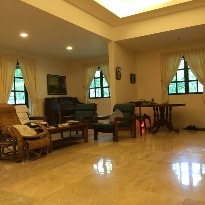 living room with a piano