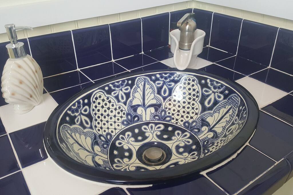Beautiful Mexican Talavera sink with farm style faucet