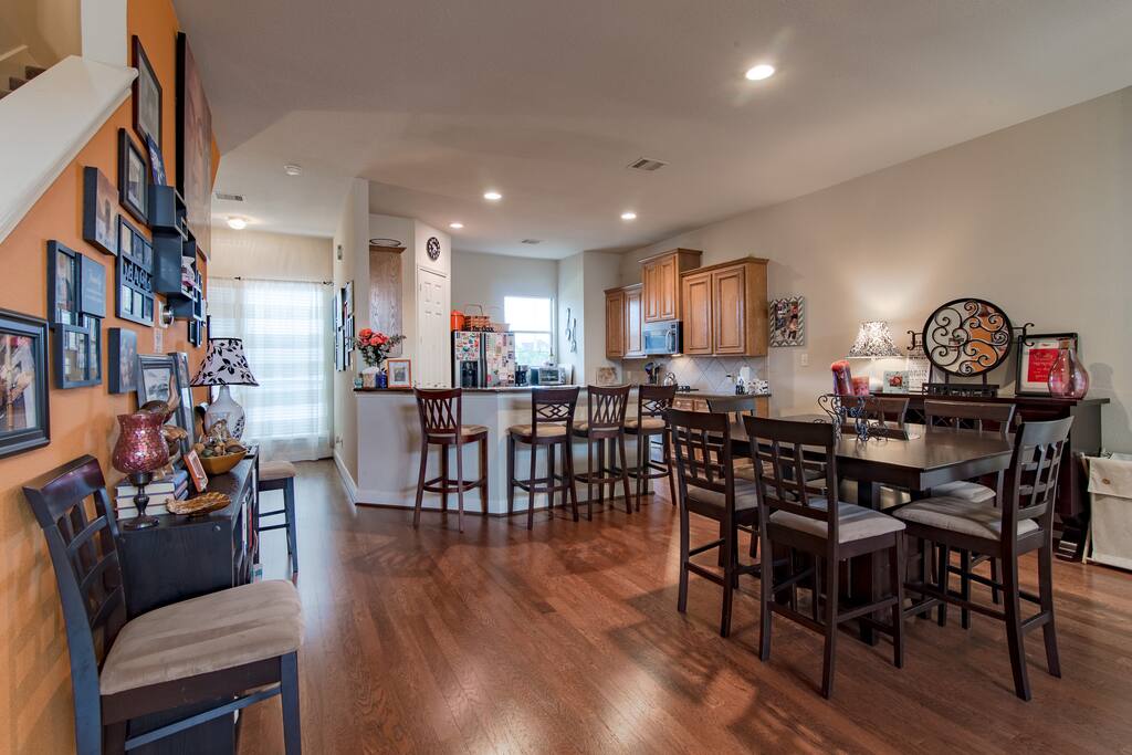 2nd Floor | The dining table & kitchen bar provide seating for 12.
