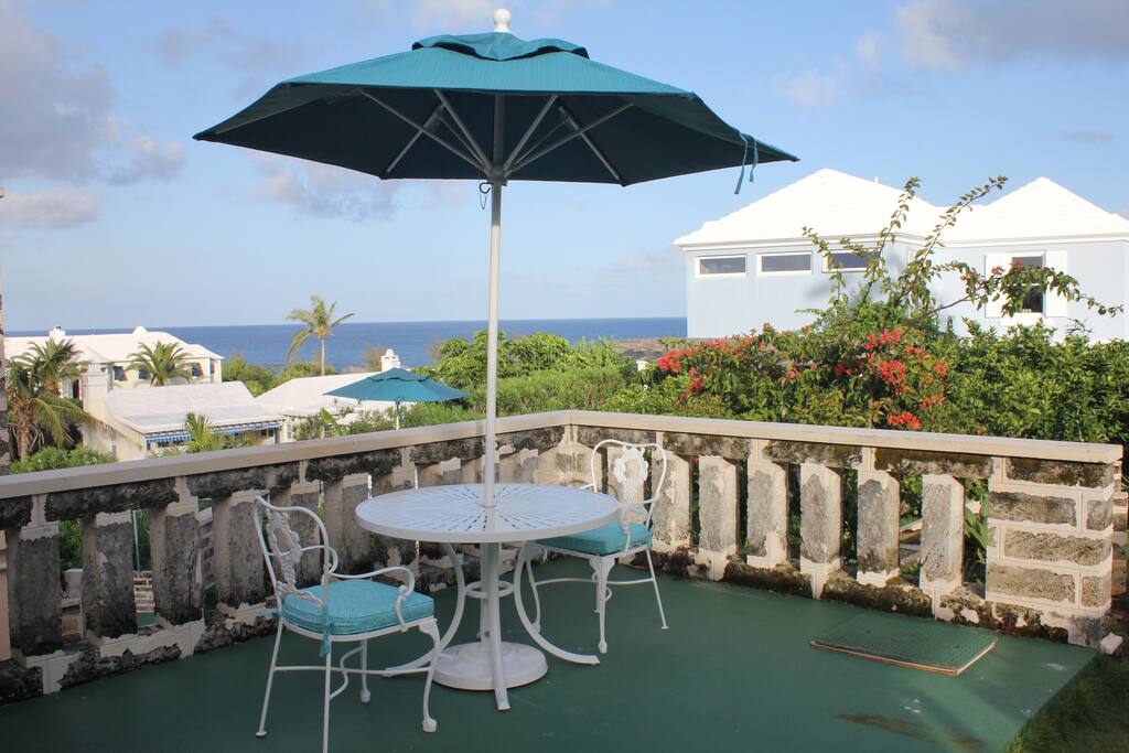 B & B Suite deck, with table chairs and umbrella