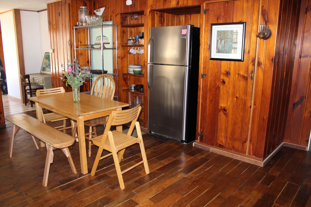 Stainless steel appliances and hardwood everywhere