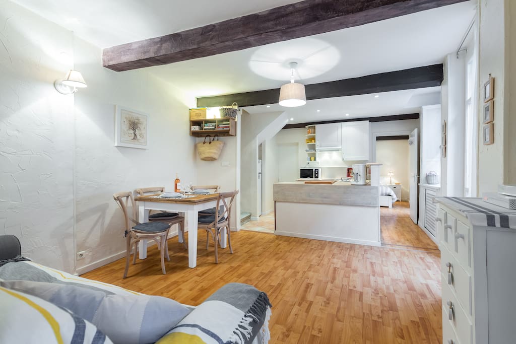 Comfortable, open plan sitting/dining room.