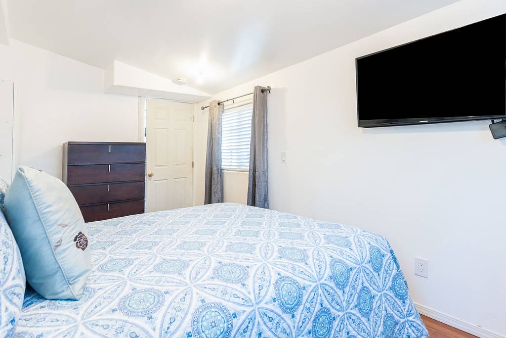 Bedroom with Smart TV.