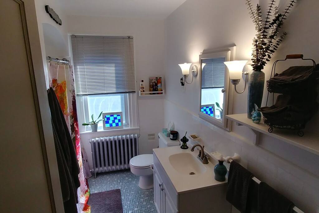 Shared bathroom with shower/bath.