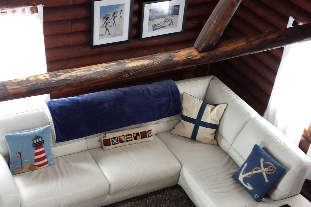 View of leather sleeper sofa from loft.