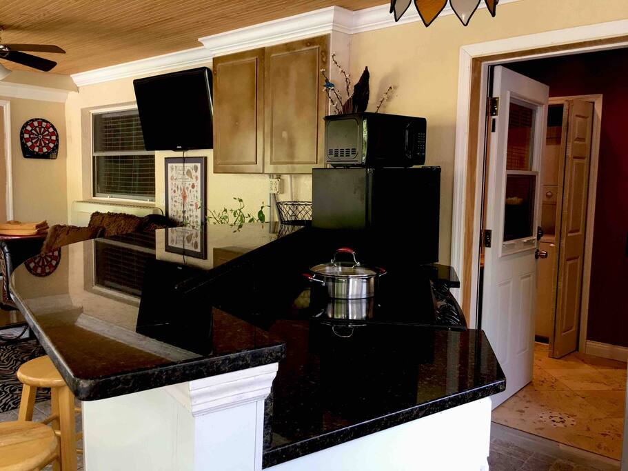 you have your own outdoor kitchen that's screened in so that bugs don't get in