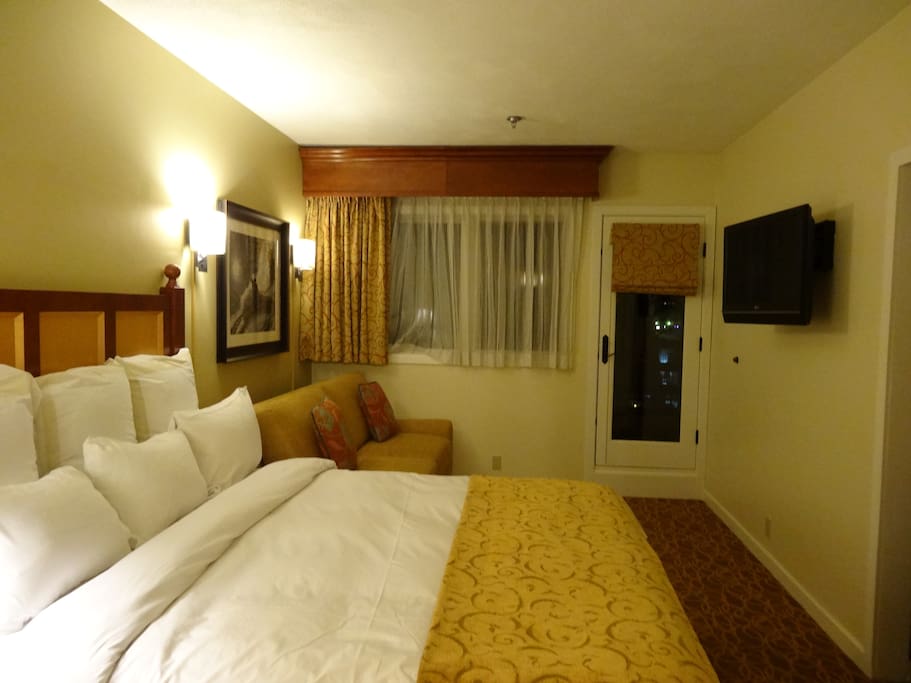 Master bedroom with king bed and double sofa sleeper.