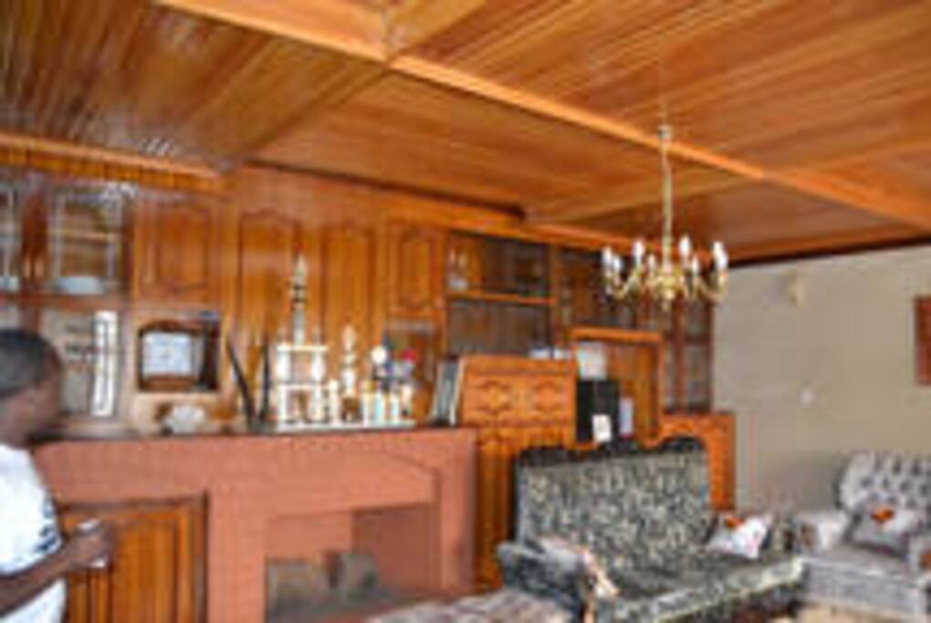 Ground floor lounge with an indoor fireplace