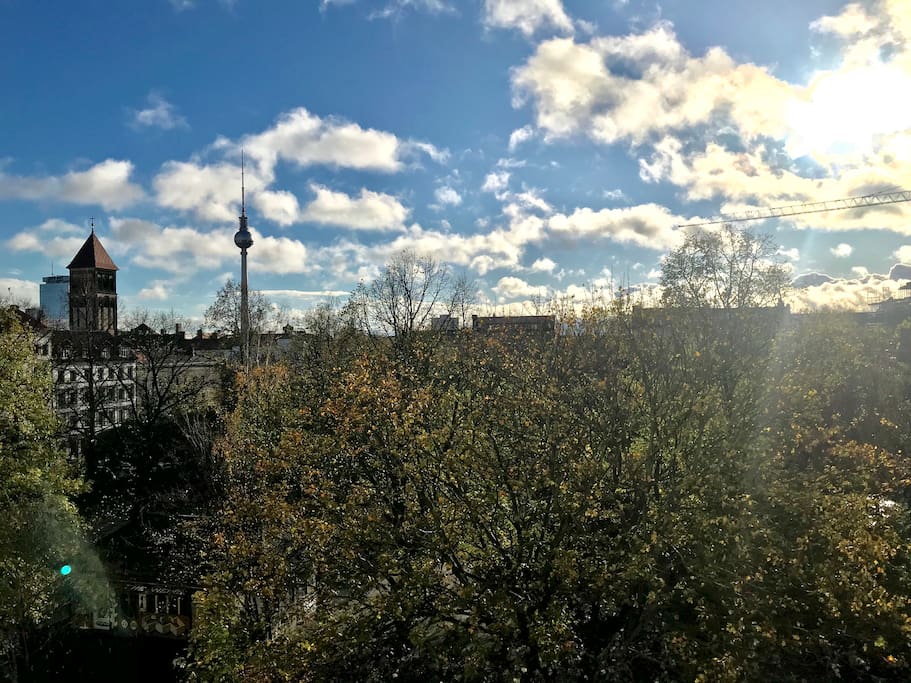 Park view from living room with television tower at Alexanderplatz