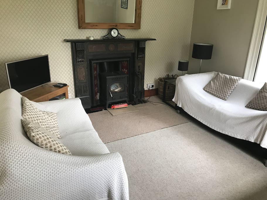 Lounge with 3 x sofas and sky tv