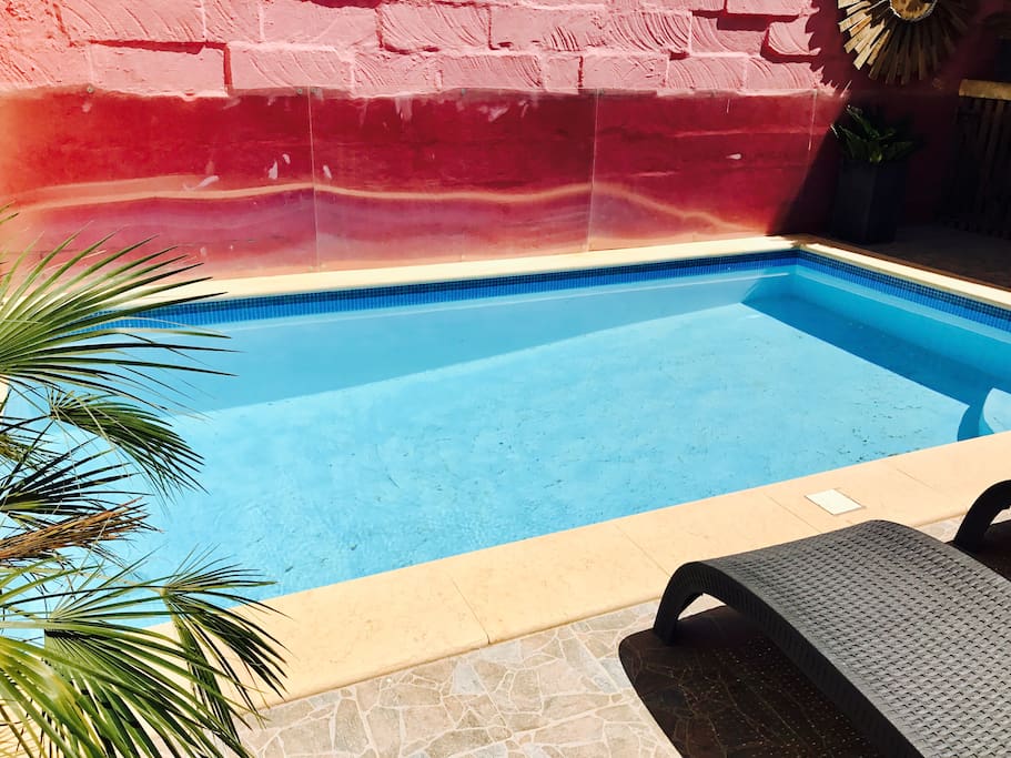 sunny private pool with sun loungers, gas BBQ and table + chairs