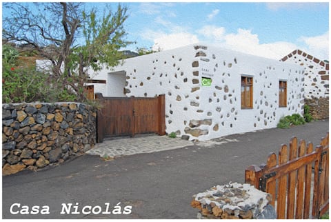 Country house with almond and fruit orchards.