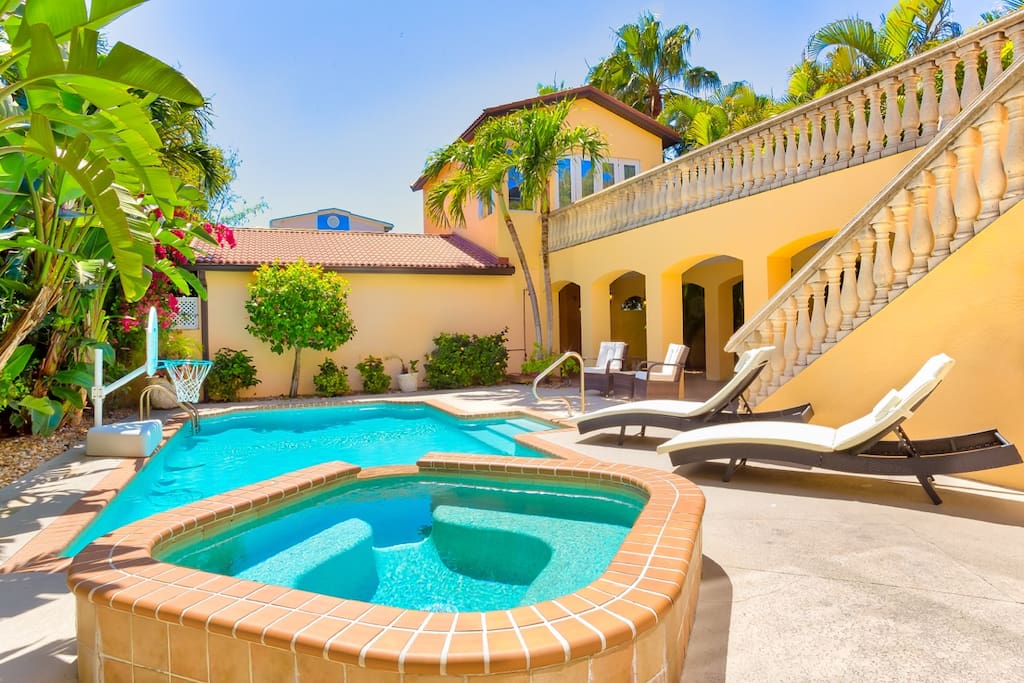 Fabulous pool and spa surrounded by tropical palms, plants and beautiful colors. Crazy relaxing...or crazy fun? You decide, it's your vacation!