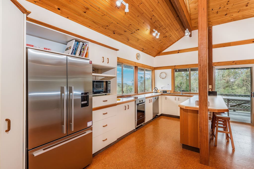 Open plan kitchen with high ceilings