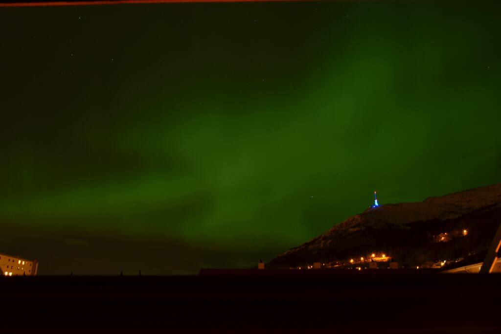 Northern lights with Ulriken. Picture taken from the kitchen in March 2016.