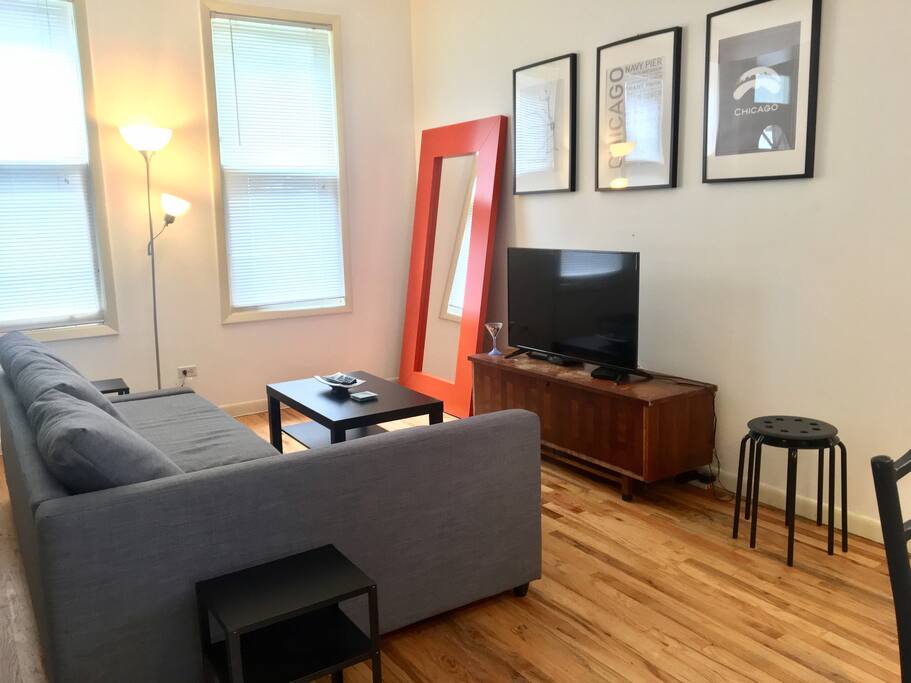 Living Room: Located on 1st floor. 43" TV, wifi. Pull-out couch.
