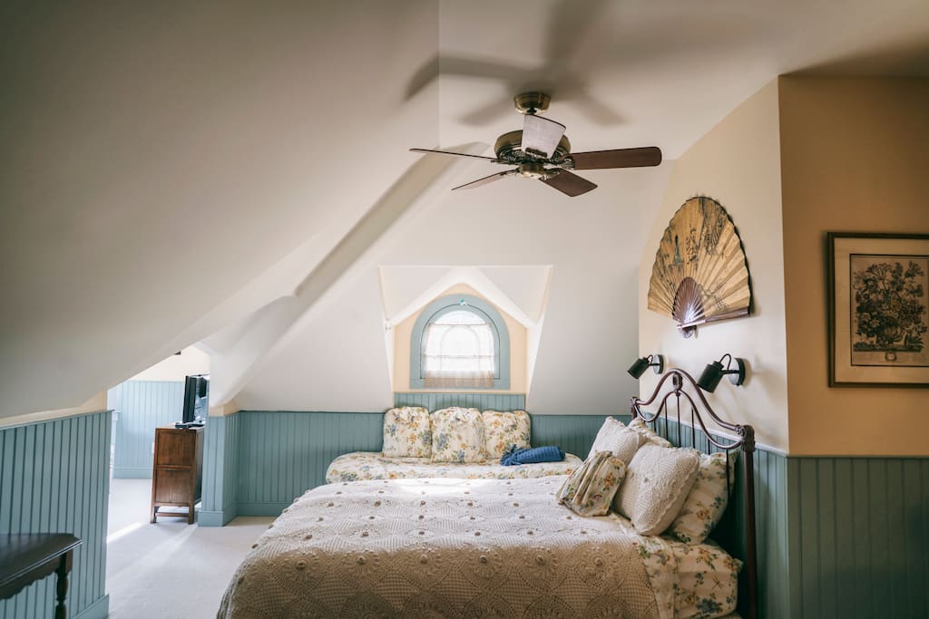 Tilghman Island Room - Bedroom with Daybed under Victorian Dormer Window & Entrance to Turret Sitting Room