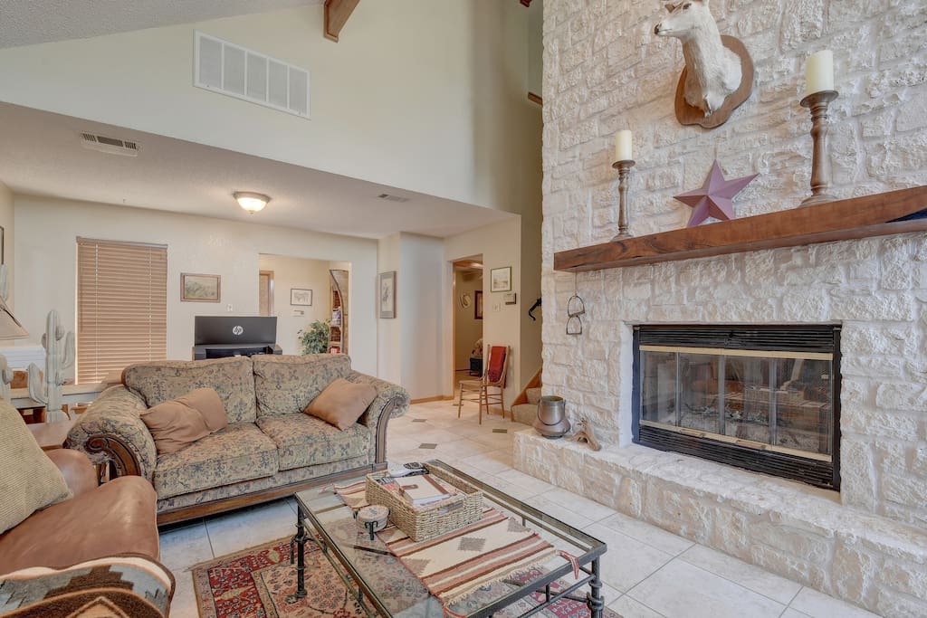 Keep warm around this beautiful wood-burning fireplace.