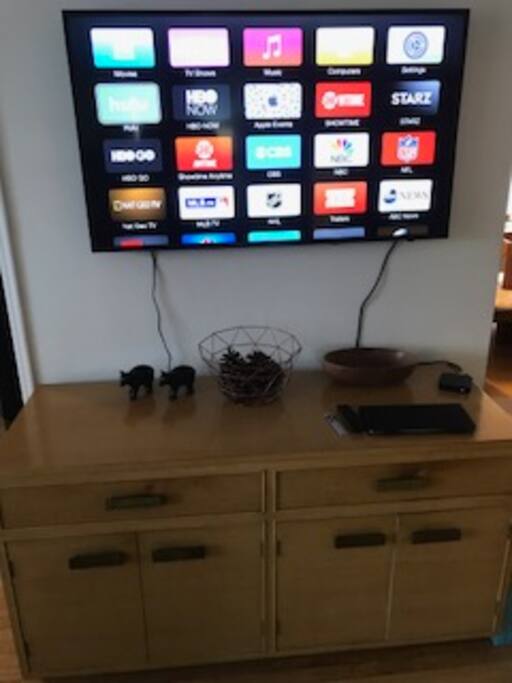 In our living room we have 50" tv that can be used to surf, apple tv, hulu and netflix. Listen to music. The keyboard works too!