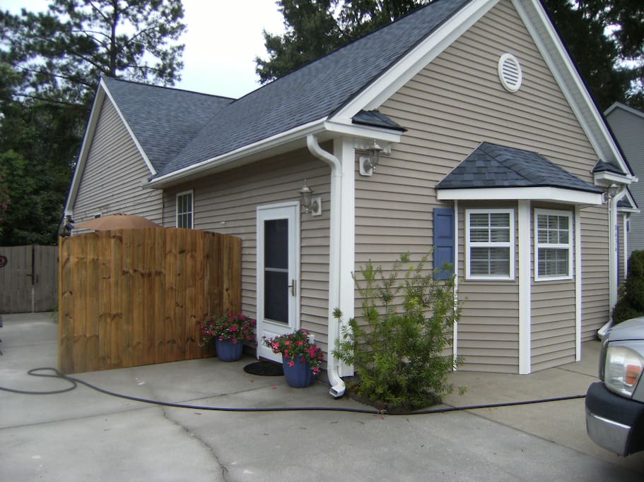 The drive way provide your own parking space, and the entry door has a lighted keypad lock.