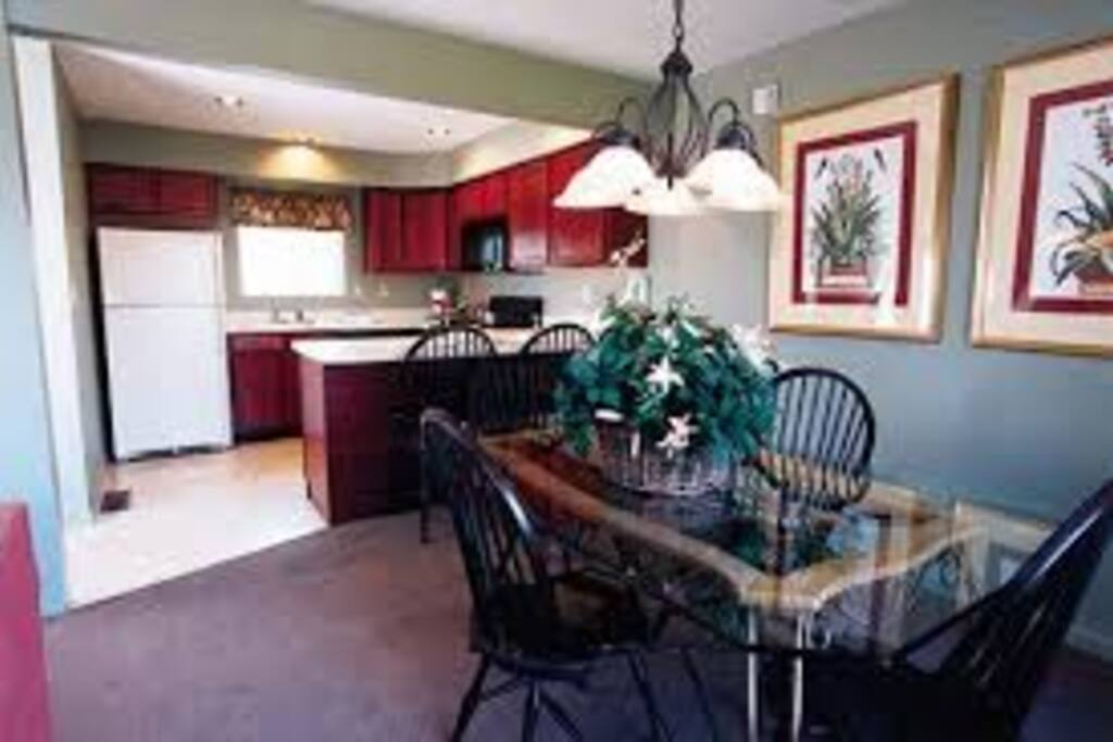 Dining table in the dining area of a 1-bedroom villa