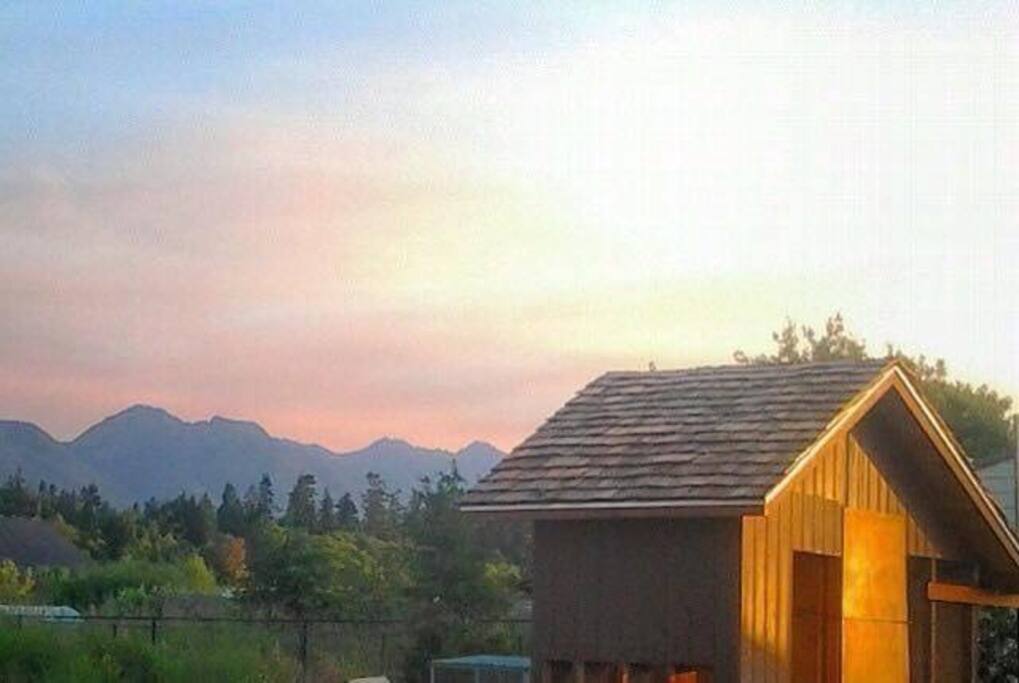 Southwest view across garden and chicken coop