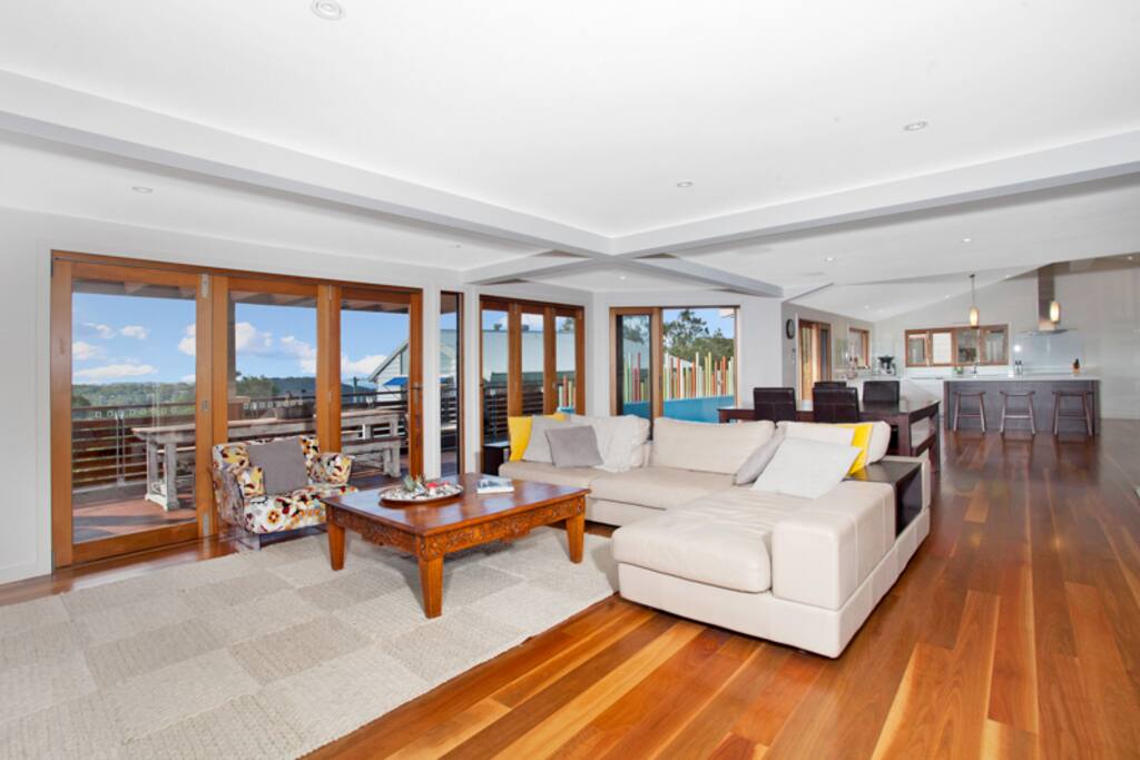 Open plan Lounge, Dining & Kitchen bi-fold doors onto the pool Deck