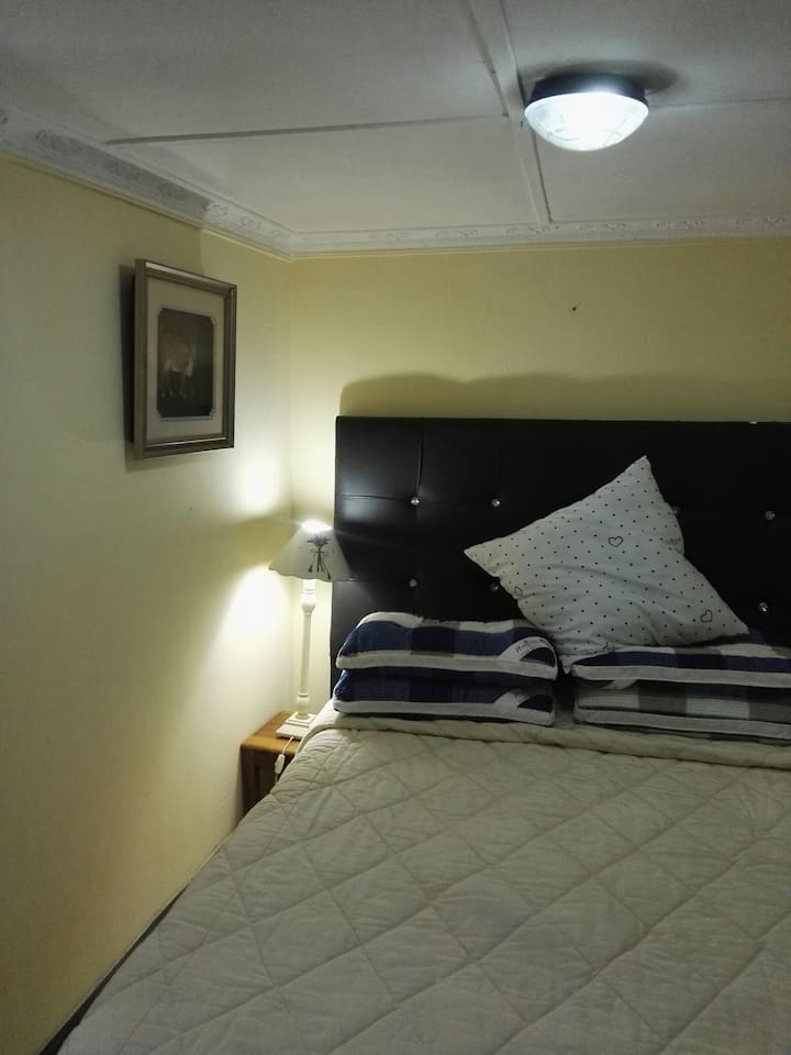 double size bed and mattress, side lamp