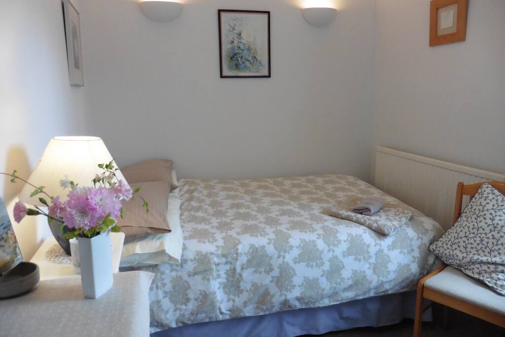 Comfortable three quarter size bed fine for two people. A variety of lighting options.
