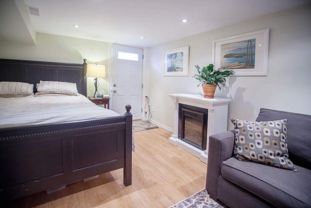 Bedroom with electric fireplace