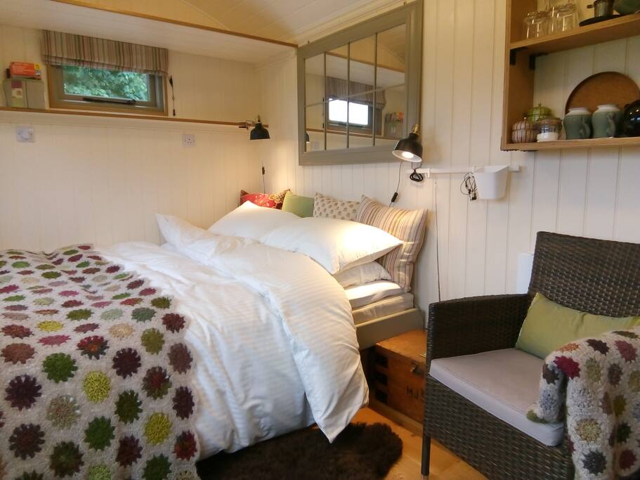 Comfortable king-size bed with high quality natural bedding - traditional arrangement