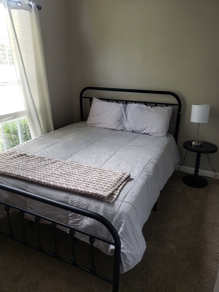 Second bedroom with a queen bed. 