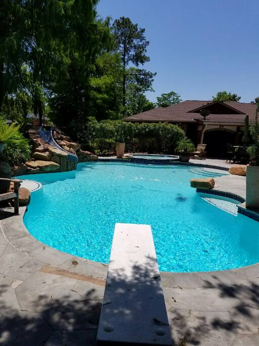Sparkling pool with outdoor kitchen