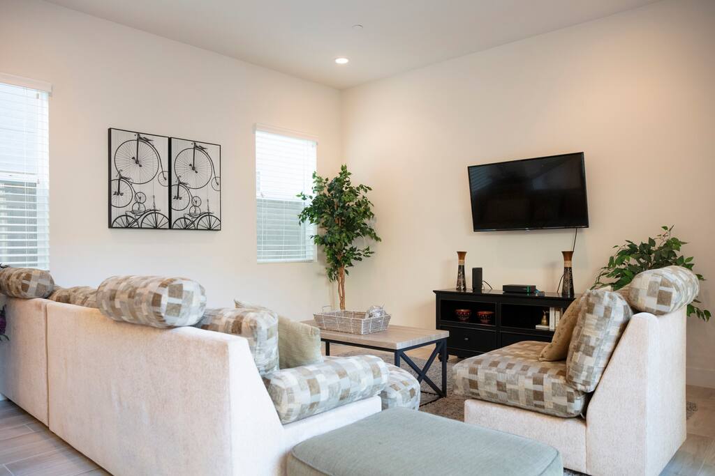 Sink into the soft sofa and enjoy HDTV.