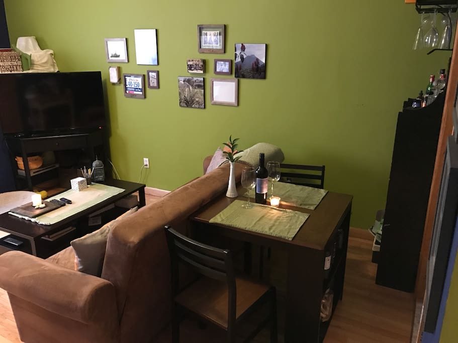 Open space design with small dining set off the kitchen
