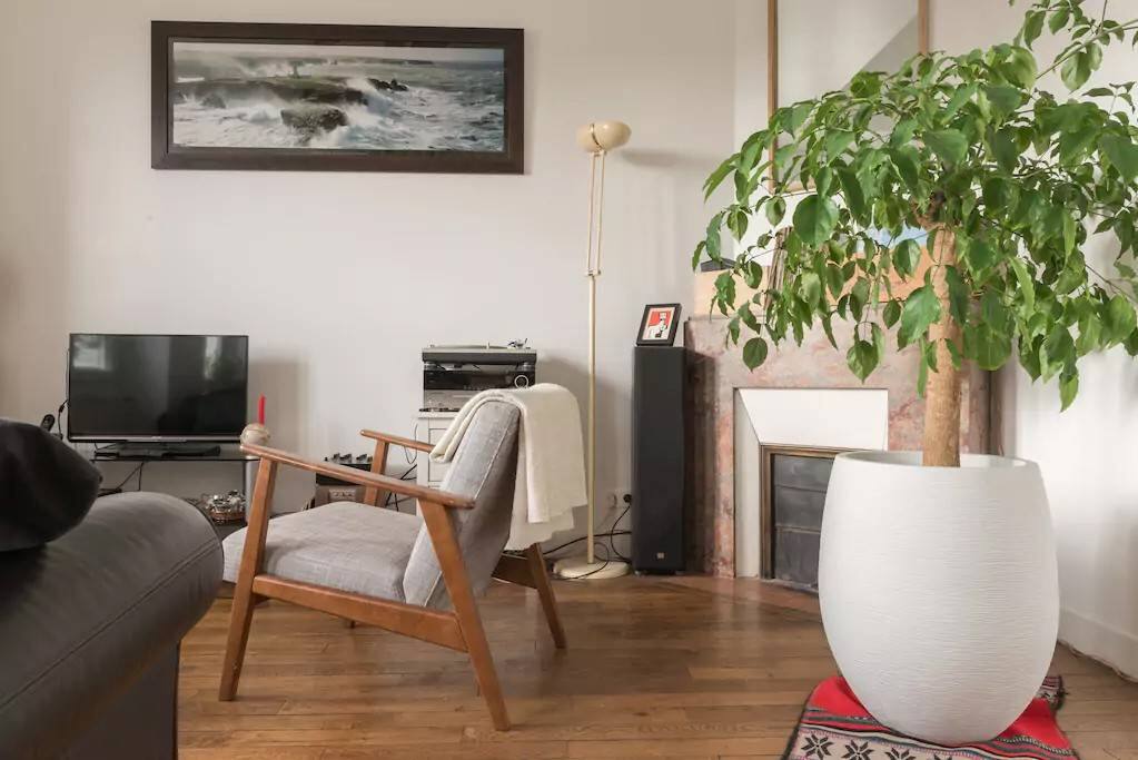 Nice living room with comfortable sofa and flat screen TV