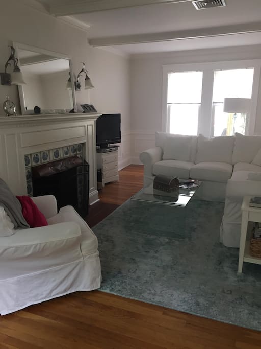 Living room with wood burning fireplace