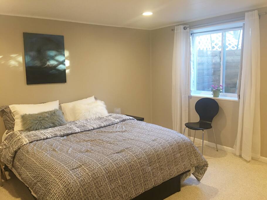 Olympic queen bed, blackout curtains for restful mornings.