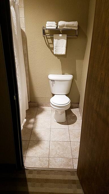 Bathroom with tub/shower and toilet