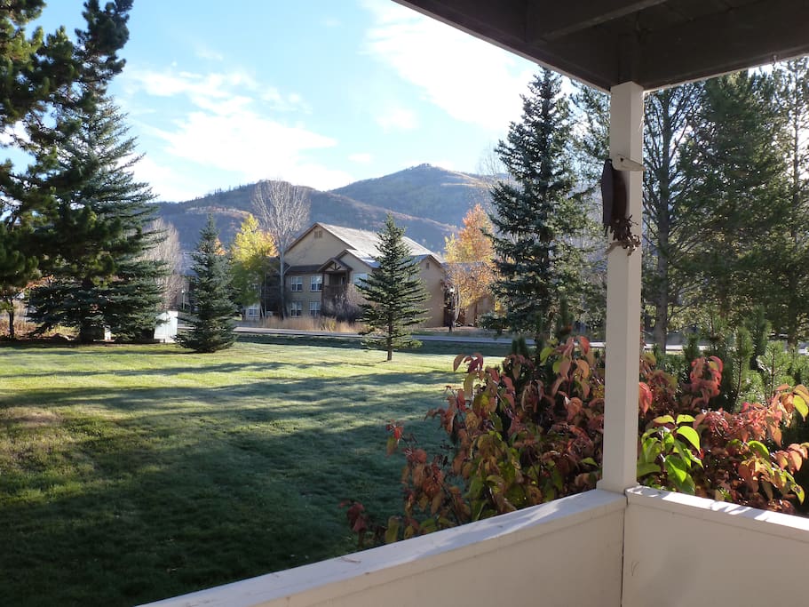 same view from the porch, along with a table and 2 chairs