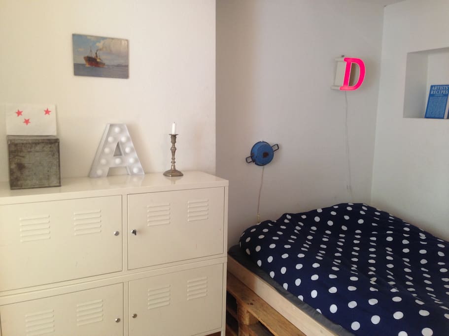 separate sleeping room with a double bed.
