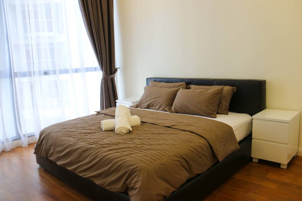 Bedroom with queen size bed and built in wardrobe