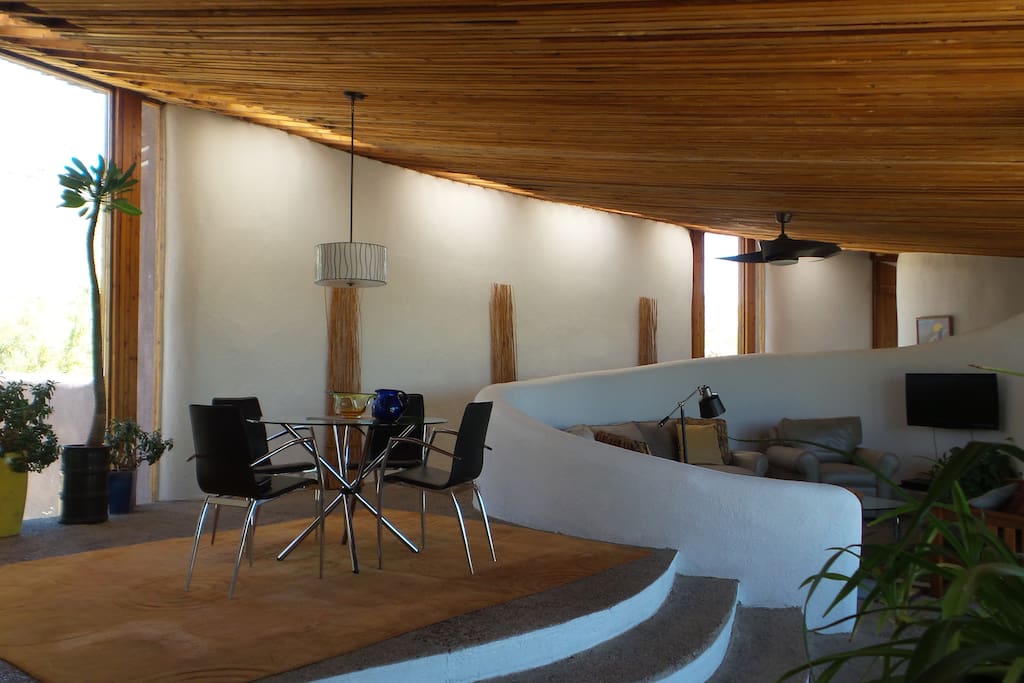 View from kitchen area looking toward dining area and living room beyond.