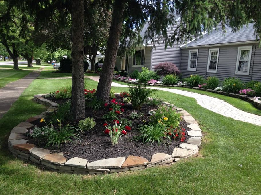 Our beautiful gardens are on a friendly neighborhood corner.
