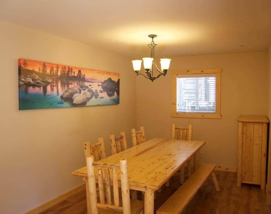 Dinning room with 8' award winning picture of Tahoe and seating for 8