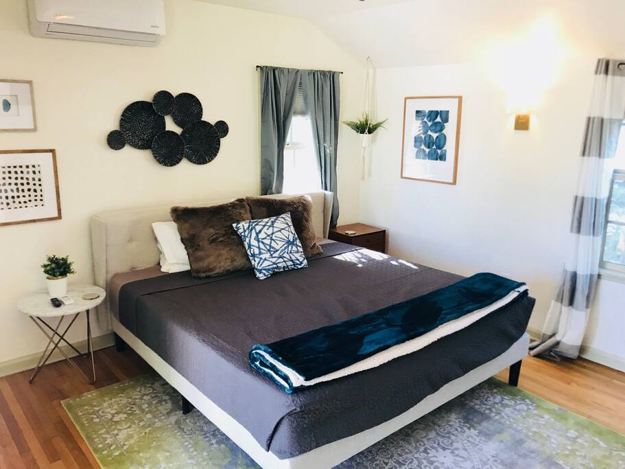 Huge king bed with a Tuft & Needle mattress.